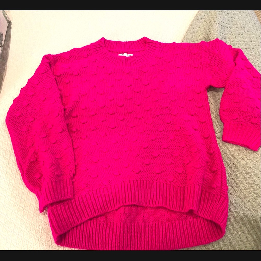 Stand out in this hot pink sweater!